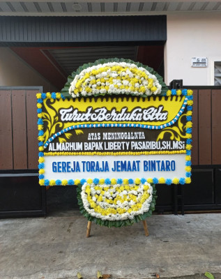 Papan Bunga Duka di Tewaan